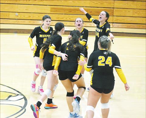 Justin Fitzgerald/sports@cherokeescout.com The Lady Bulldogs celebrate a five-set win over Hayesville on Sept. 26.