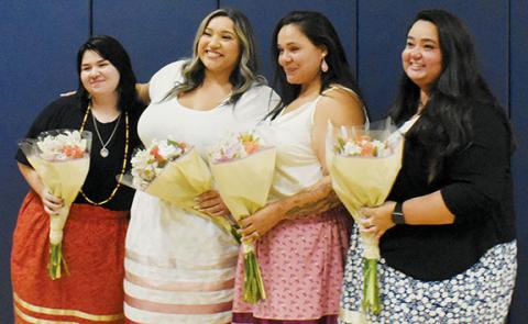 Dadiwonsi Language Program graduates stand in recognition at the end of the ceremony on Sept. 26. From left are Jazlyn “Wadulisi” McEntire, Cailon “Uwodsdi” Garland, Kirstie “Tsayga” Frady and Gina “Amage” Myers.