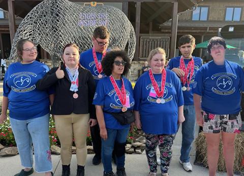 Athletes attending the Special Olympics of N.C. State Equestrian Tournament are (front from left) Liz Jennings, Lana Foster, Keisha Carter, Christina Zimmerer and Marian Carter; (back from left) Josh Mills and Nathan Young.