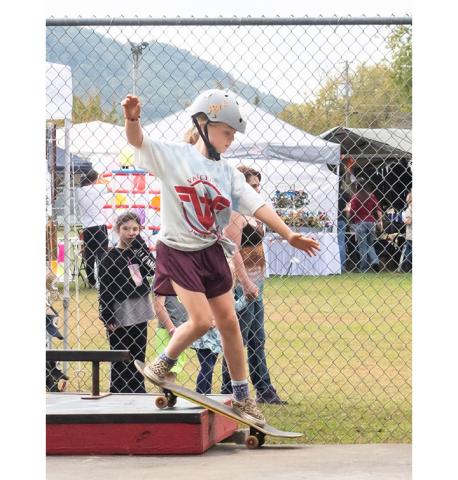 Sam Jokich/Staff Correspondent This young girl was practicing tricks on her skateboard during the Cherokee County Fair in Andrews on Oct. 15.