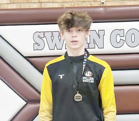The Murphy wrestling team only brought six boys and one girl to the Maroon Devil Invitational at Swain County on Nov. 18. Mason Ray and Gabe Chastain (shown above) won their way through wrestle-backs to third-place finishes. While Aiden Smith came up just short of medaling in her bracket, she won her way to the consolation finals to finish fourth. Coaches said the team showed lots of improvement throughout the day.