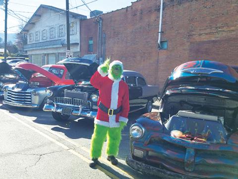 Bill Belian/Contributing Photographer  Who doesn’t enjoy a good car show? That even includes the Grinch, who was spotted several times smiling at all the automobile beauties during past Christmas on Main Street festivals in downtown Andrews. 
