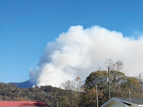 Randy Foster/editor@cherokeescout.com Smoke from the Collett Ridge Fire was a nuisance near downtown Andrews at the height of the blaze this month.