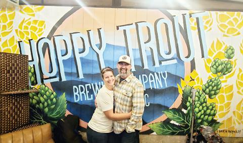 Nicole Wright/Staff Correspondent Kam and Corey Thompson are stoked to be the new owners of Hoppy Trout Brewing Co. on Main Street in downtown Andrews. They have already made positive changes.