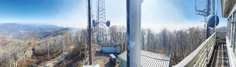 Photos by Randy Foster/editor@cherokeescout.com The smoke from the Collett Ridge Fire is visible from a forestry tower. Andrews is located at the right in this image.