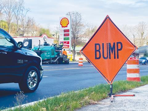 Randy Foster/editor@cherokeescout.com Grading machinery puts new pavement along U.S. 64 West in Murphy on Friday. The latest phase of this highway project is expected to put on the finishing touches before a separate project to install a roundabout nearby.