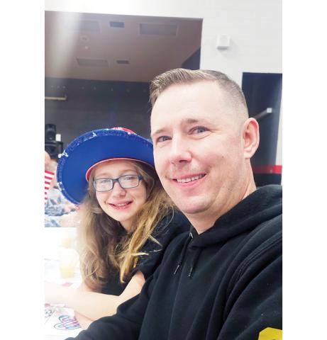 Nicole Wright/Staff Correspondent Despite serving on active duty in Fort Benning, Ga., Ray Blackwell surprised his fifth-grade daughter, Kylie, for breakfast Thursday at Andrews Elementary School.