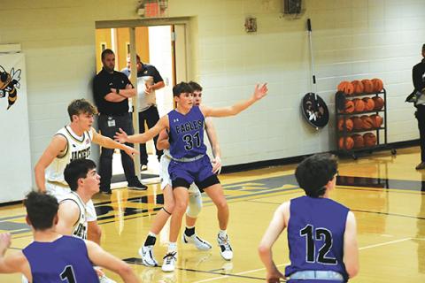 Photos by April McNabb/Contributing Photographer Jonah Hamby (31) calls for the ball during the Hiwassee Dam varsity boys basketball team’s game against Hayesville on Nov. 21, which the Eagles lost 61-55. Hiwassee Dam hosted Coppin Basin, Tenn., after the Cherokee Scout’s press time Tuesday.