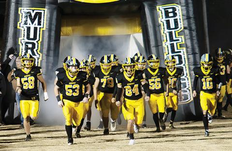Sam Jokich/Staff Correspondent The Bulldogs came out strong and only got stronger as they game went on in a 57-21 route of Polk County on Friday night in Murphy.