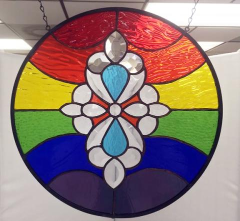Raffle! Win this beautiful stained glass piece by Steve Riedel.