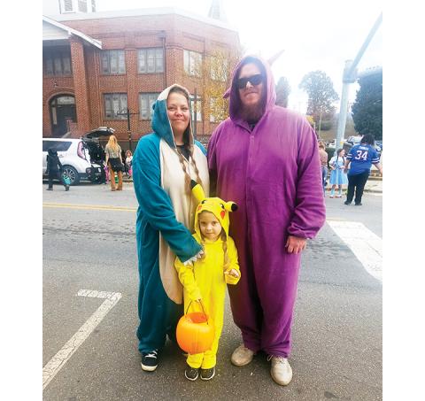 Photos by Nicole Wright/Staff Correspondent Lindsey, Addy and Eric Vandewerker as Pokemon had a good time Saturday during the Andrews Chamber of Commerce’s annual Trunk of Treat event downtown.