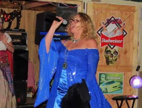 Joy Stein doing extreme lip-synching at a friend’s house during a party.