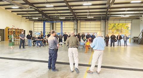 Members of the Peachtree Fire & Rescue Department hear about improved insurance ratings at the fire house on Nov. 30