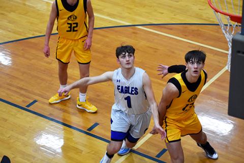 April McNabb/Contributing Photographer The Hiwassee Dam basketball teams split with Murphy on Dec. 12. The Lady Eagles beat the Lady Bulldogs 67-40, while the boys team lost 75-66 in what people in the crowd called a great game.