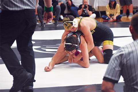 Audrey Colvin/The Graham Star Murphy’s Dalton Farmer (132 pounds) maintains top control over Robbinsville’s Christian Phillips in a consolation semifinal bout at the James Orr Invitational on Saturday.