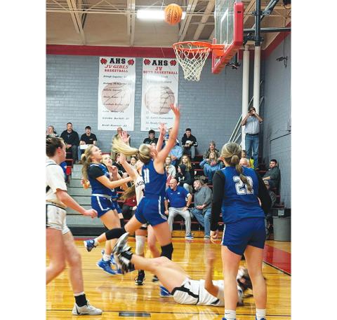 J.R. Carroll/Staff Correspondent Hiwassee Dam’s Katie McNabb goes up for hard shot Friday night in the paint against Andrews. She scored 22 points in the game.