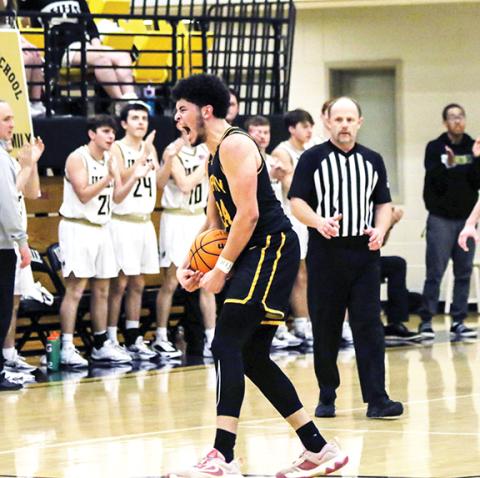 Cannon Crompton/sports@cherokeescout.com Murphy’s Dominick Rummler celebrates after a dunk on Hayesville on Friday night.