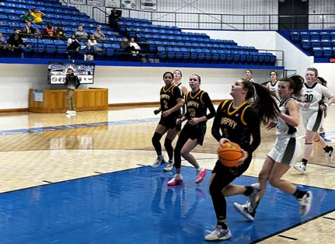 J.R. Carroll/Staff Correspondent. The Murphy girls basketball teams head downcourt during a fast break earlier this season.