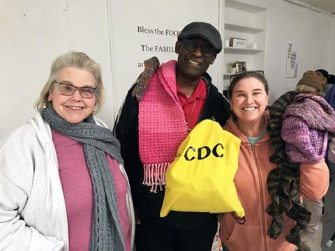 Olive’s Porch and the Texana Community Development Club came together Friday to help the homeless with warm items for the colder months. From left are Vickie Sullivan, Eurial Turner and Cathy LaTulipe.
