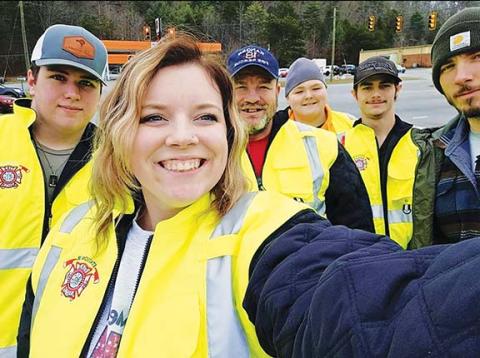 Mike Taylor/Contributing Photographer Firefighters and an officer with the Murphy Police Department came together to bring a little extra joy to Cherokee County kids on Christmas by holding a boot drive in front of Hot Spot at the intersection of U.S. 64 and Blairsville Highway in Ranger on Dec. 16. From left are junior firefighter Trenten Beavers, Niki Roberson, Chief Mike Taylor, Landon Taylor Jr., firefighter Tyler Miller and Murphy police Officer Nick Roberson.