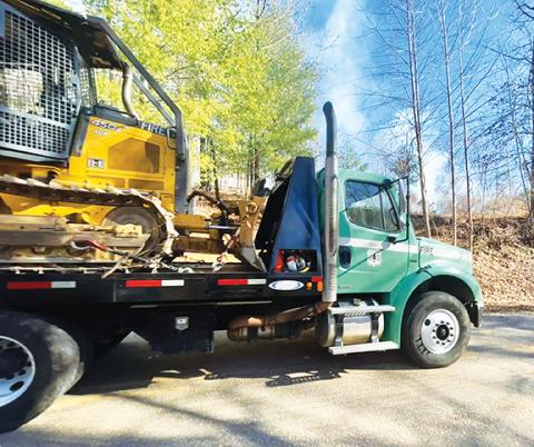 Randy Foster/editor@cherokeescout.com Dozed on: A U.S. Forest Service bulldozer is deployed to the Bonnie Brae Incident northwest of Western Carolina Regional Airport in Andrews on Feb. 6.
