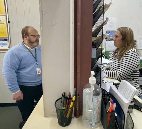 Randy Foster/editor@cherokeescout.com Wayne Goodwin, commissioner of the N.C. Division of Motor Vehicles, chats with local worker Phoebe Donohue during an unannounced visit to the license plate office in Murphy on Feb. 13.