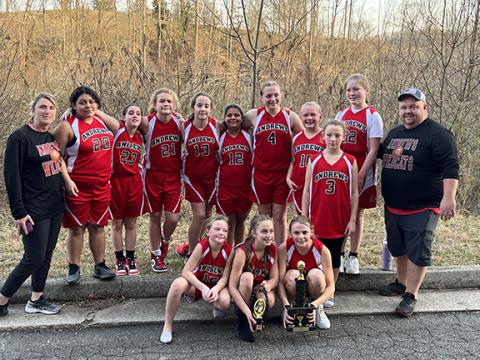 Kevin Hensley/The Graham Star The Andrews Girls Mite championship team with their trophies. 