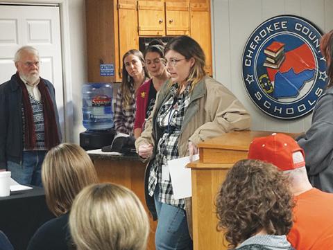 Photos by Randy Foster/editor@cherokeescout.com Parents express their displeasure with a school board decision to reorganize four schools in the coming year.