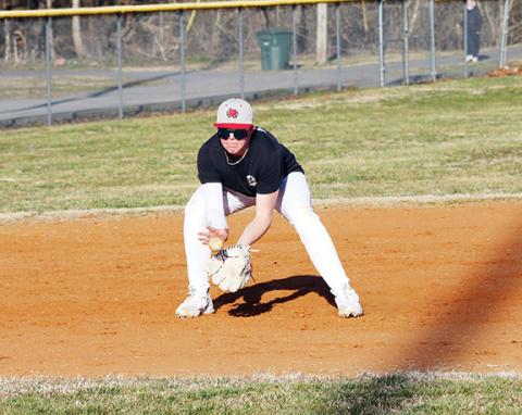 Cannon Crompton/sports@cherokeescout.com Andrews’ Aiden Garrett fields a ball during baseball practice last week.