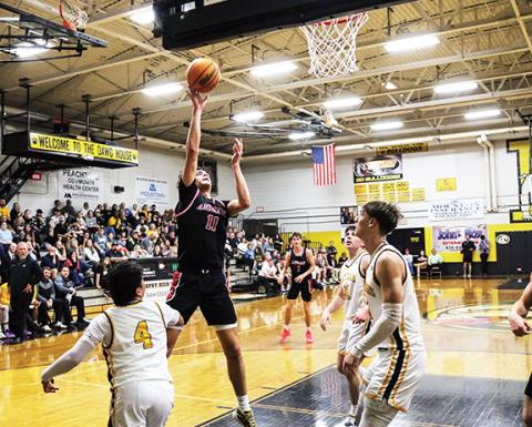 Cannon Crompton/sports@cherokeescout.com Cam Rattler, who had 29 points against Hayesville, goes for a layup against Murphy earlier in the week.