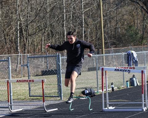 Cannon Crompton/sports@cherokeescout.com Andrews’ Jesus Jimenez works on hurdles during practice last week.