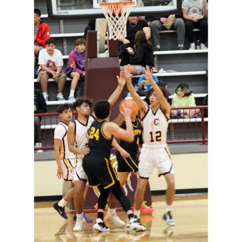 J.R. Carroll/Staff Correspondent Murphy’s Dominick Rummler takes on a double team in the paint against Cherokee in the conference tournament.