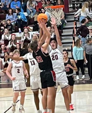 Jeff Tatham/ Contributing Photographer Ty Clark goes up for points at Swain on Feb. 13.