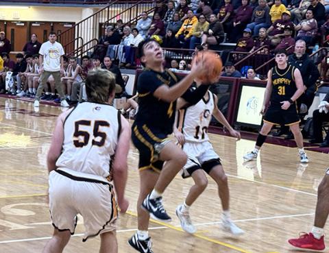 J.R. Carroll/Staff Correspondent Murphy’s Xander Wachacha goes up for a layup against Cherokee on Friday.
