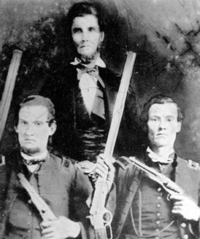 George Washington Kirk (lower right) with his father and brother, Unionists all, in a family photograph from early in the Civil War.