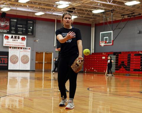 Cannon Crompton/sports@cherokeescout.com Kinleigh Queen working on pitching during an indoor practice on March 6.