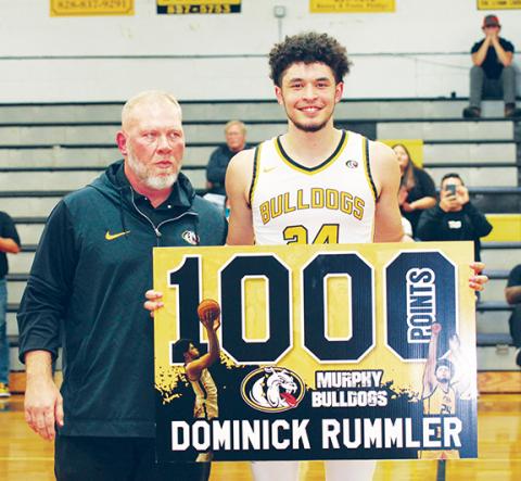 J.R. Carroll/Staff Correspondent Murphy boys coach Eric Laney (right) with Dominick Rummler (left) on Feb. 27.