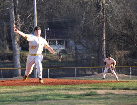 J.R. Carroll/Staff Correspondent Murphy’s Caleb Kephart pitches as Alex Golden looks on during a March 4 game.