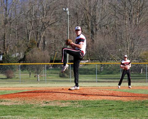 Wildcats pitcher Braxton Rickett delivers a pitch against Hayesville on March 12.