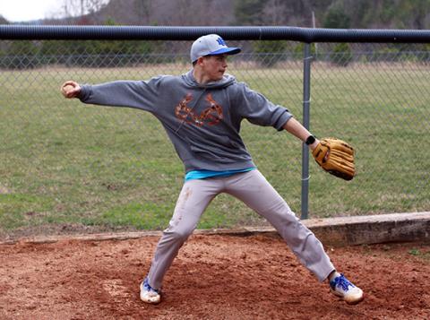 Cannon Crompton/sports@cherokeescout.com Freshman Nickolas Sorbera works on pitching at practice on March 5.