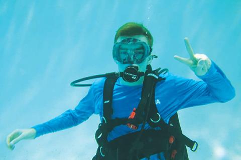 Kamdyn Koop loves being in the water and even became certified as a scuba diver. He hopes to explore the coral reefs in the future.