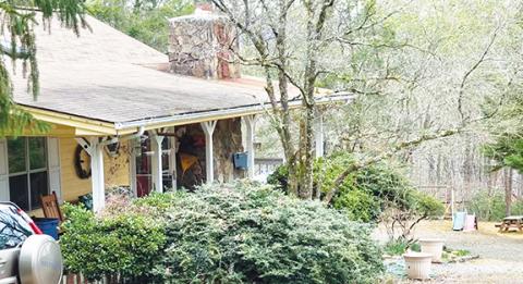 Randy Foster/editor@cherokeescout.com This house at 75 Gooseberry Road in the Harshaw community of Murphy is where a mother allegedly drowned her 4-year-old twin sons Saturday.