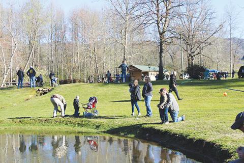 Photos by J.R. Carroll/Staff Correspondent Top: Almost 300 people attended the Kids Fishing Day on Saturday at the Cherokee County Sheriff’s Ranch in Marble. 