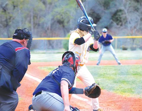 J.R. Carroll/Staff Correspondent Hiwassee Dam’s Trenten Beavers catches as Murphy’s Tommy Crapse hits on April 2.