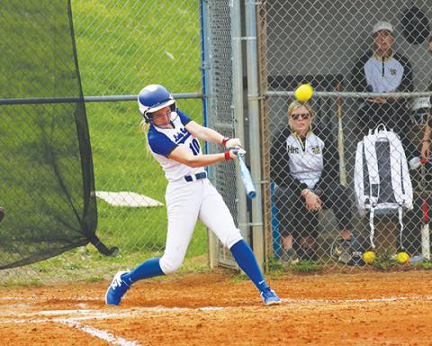 Cannon Crompton/sports@cherokeescout.com Katie McNabb of Hiwassee Dam follows through with her home-run swing against Hayesville on March 27.