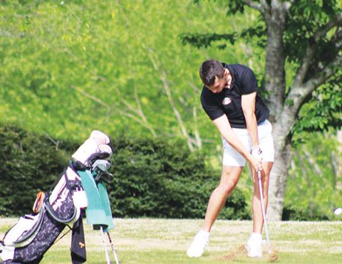 J.R. Carroll/Staff Correspondent Murphy golf team member Andrew Barolet tees off at Mountain Harbour Golf Club on Thursday.