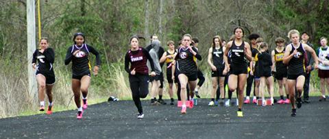 J.R. Carroll/Staff Correspondent Murphy runners (from left) Patience Garrett, Cayla Greer and Rylee Tabor competing in the 100-meter dash on April 3.