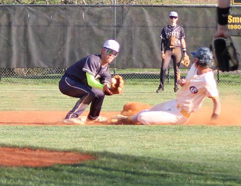 J.R. Carroll/Staff Correspondent Zack Skogen steals second base in their game against Hayesville. 