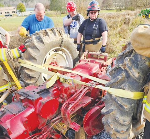 Anngee Quinones-Belian/Staff Correspondent Hard work has led to new state certifications for the Ranger Volunteer Fire Department. From left are instructor Travis Scruggs, Chief Mike Taylor and Lt. Rebecca Brege.