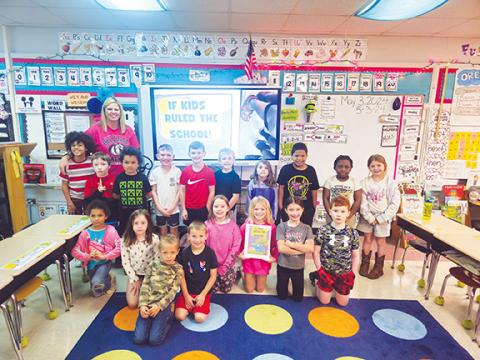 Nicole Wright/Staff Correspondent Teacher Holly Stonecypher’s first-grade class at Murphy Elementary School has a pretty good idea of what would happen If Kids Ruled the School! So they wrote a book about it.